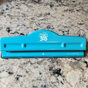 Happy planner hole puncher and workout planner/journal